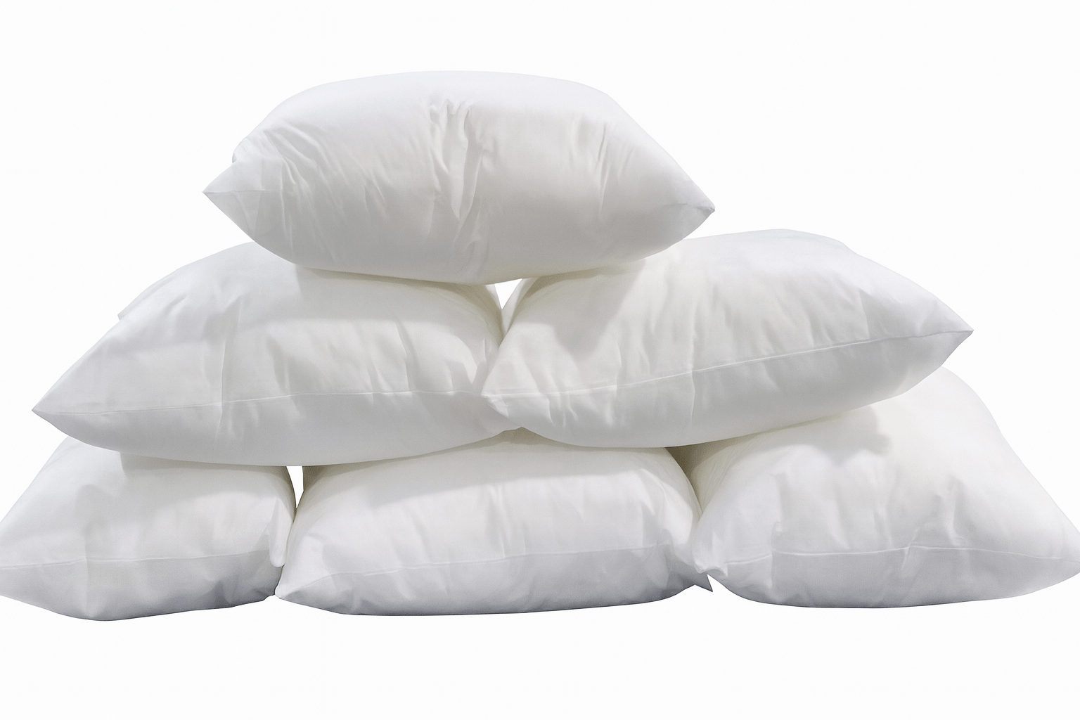 Stack of white cushion inserts.